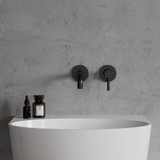 Omnires Y / basin mixer for concealed installation / Semi-matt black / on the gray wall