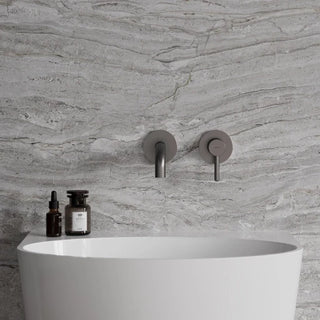 Omnires Y / basin mixer for concealed installation / Graphite / on the stone wall