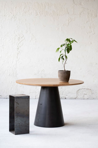 Minimalistic design dining table. Natural oak table top, concrete table base 2