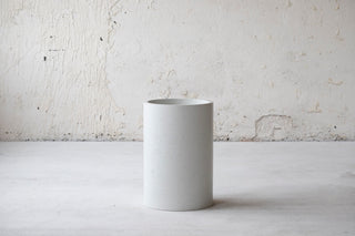 Minimalistic design cylinder base dining table. Natural oak table top, concrete table base 4